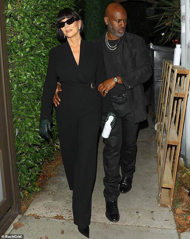 Corey stayed close to Kris while also opted for an all-black outfit as the couple left the event together