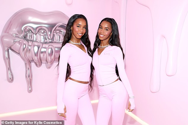 The twins also paused for photos as they explored the colorful pop-up