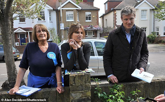 Lady Goldsmith is pictured campaigning for the Conservatives with her politician son, Zac, and daughter, Jemima