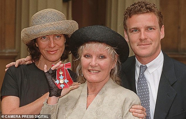 With son Paddy and daughter Barbara, having received her CBE in 1998