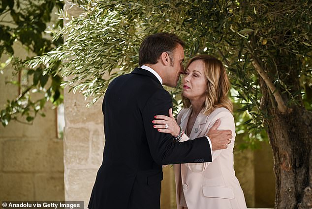 French President, Emmanuel Macron, greets Italian Premier Giorgia Meloni, at the annual G7 summit in Apulia (Puglia), Italy on June 13, 2024