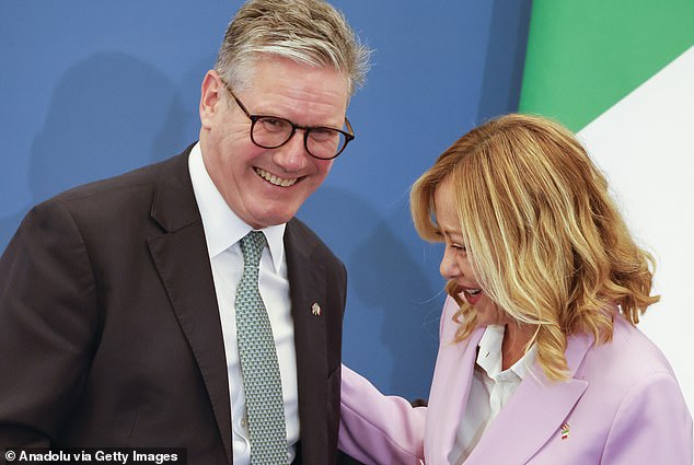 Italy's Premier Giorgia Meloni (R) and UK Prime Minister Keir Starmer (L) hold a joint press conference at the end of their meeting at Villa Pamphilj in Rome