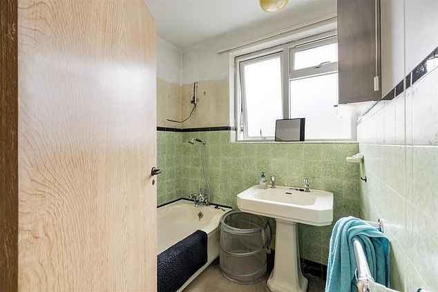 The bathrooms also look in need of a touch up, as this outdated interior on the listing shows