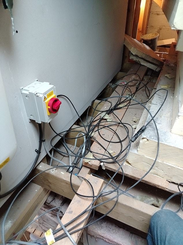 A picture taken of the solar air source heat pumps after they were installed shows the careless nature of the fitting