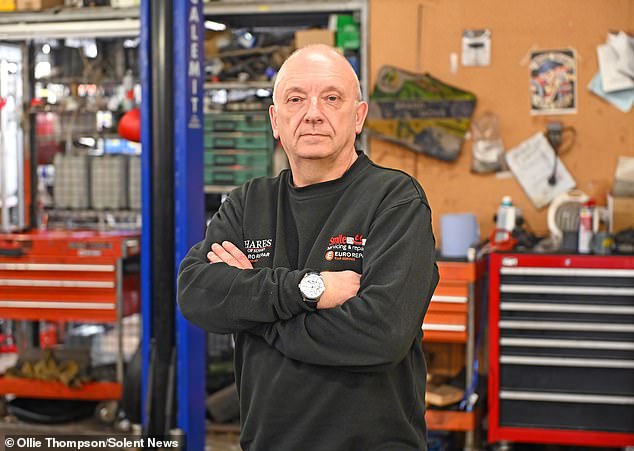 Neil at his car repair shop, Smile Servicing & Repairs Ltd, which has been plagued by a gang of teen yobs who have set fire to cars, robbed his tills and nearly injured his staff