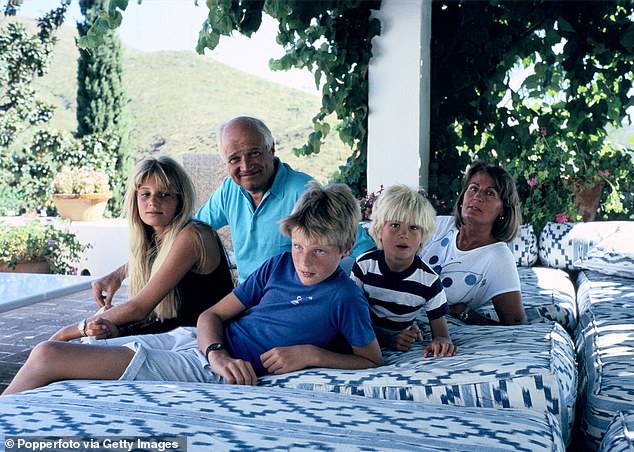 Images from the Goldsmith archives (pictured) show three of Lady Annabel's children ¿ a young Jemima Khan with brothers Zac and Ben Goldsmith ¿ relaxing with their father, the late financier Sir James Goldsmith, on the same bed