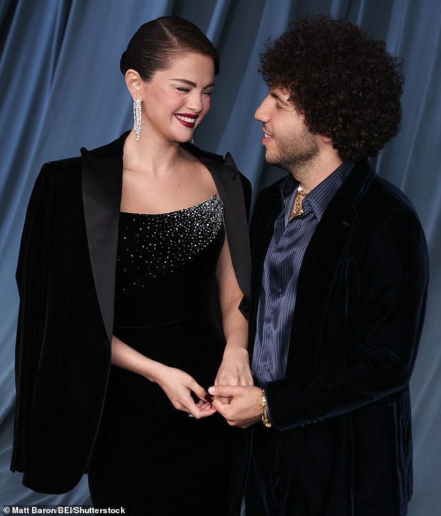 Blanco dressed for the occasion donning a dark navy suit that was also made of velvet material