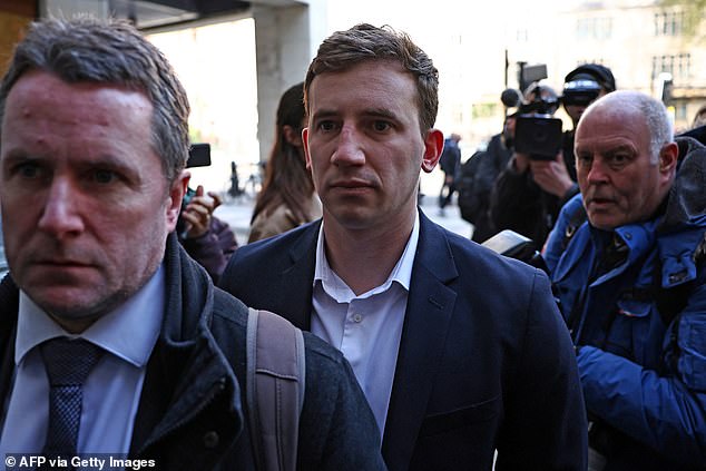 Mr Berry's link to Chris Cash (pictured) - a parliamentary researcher from Edinburgh who has also been accused of spying for China - was revealed when officers seized his phone and laptop at Heathrow