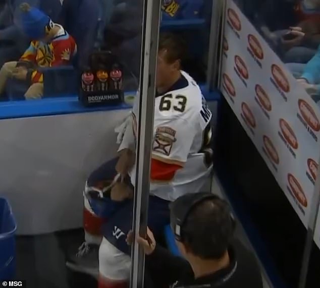 Marchand ripped the straps off of Dahlin's helmet as he sat in the penalty box