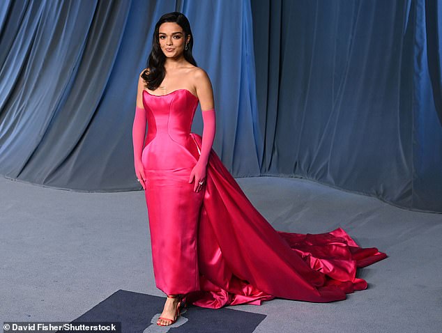 Rachel Zegler turned heads wearing a strapless pink gown with a long train that flowed down behind her