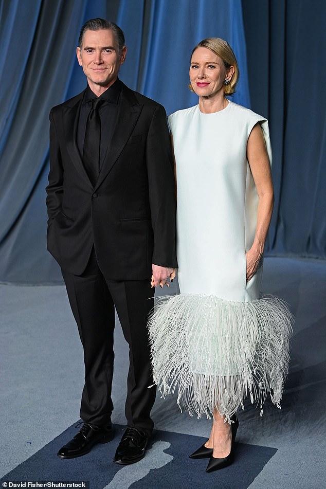 Billy Crudup donned a black suit which was paired with a black dress shirt and tie while Naomi Watts wore a white dress with feathery details on the bottom