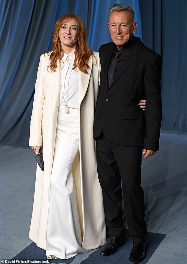 Bruce Springsteen was dressed for the occasion wearing a classic black suit and was accompanied by wife Patti Scialfa who donned an all-white ensemble