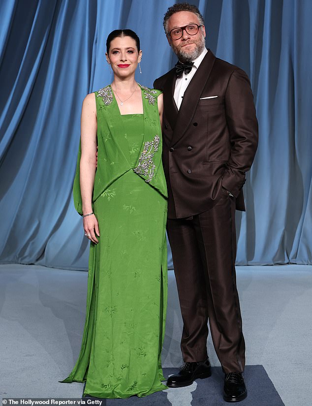 Lauren Miller Rogan stunned in a classy green gown while Seth Rogan was dapper in a dark brown, double-breasted suit