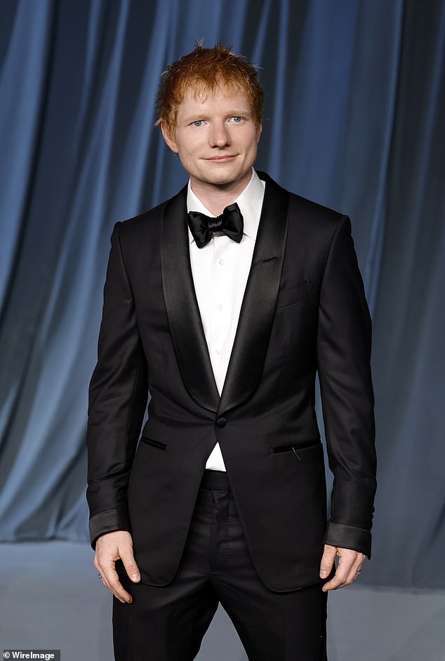 He added a black bow tie to the look