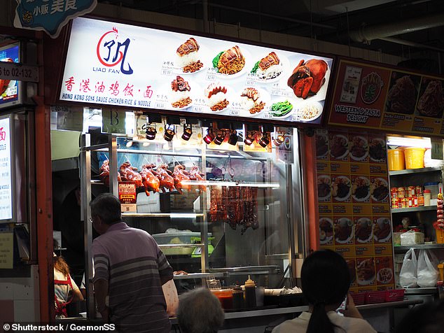 Michelin stars have also been awarded to hawker stalls in countries like Singapore - including Liao Fan Hong Kong Soya Sauce Chicken Rice & Noodles (pictured), which was awarded one star in 2016 but has since lost it