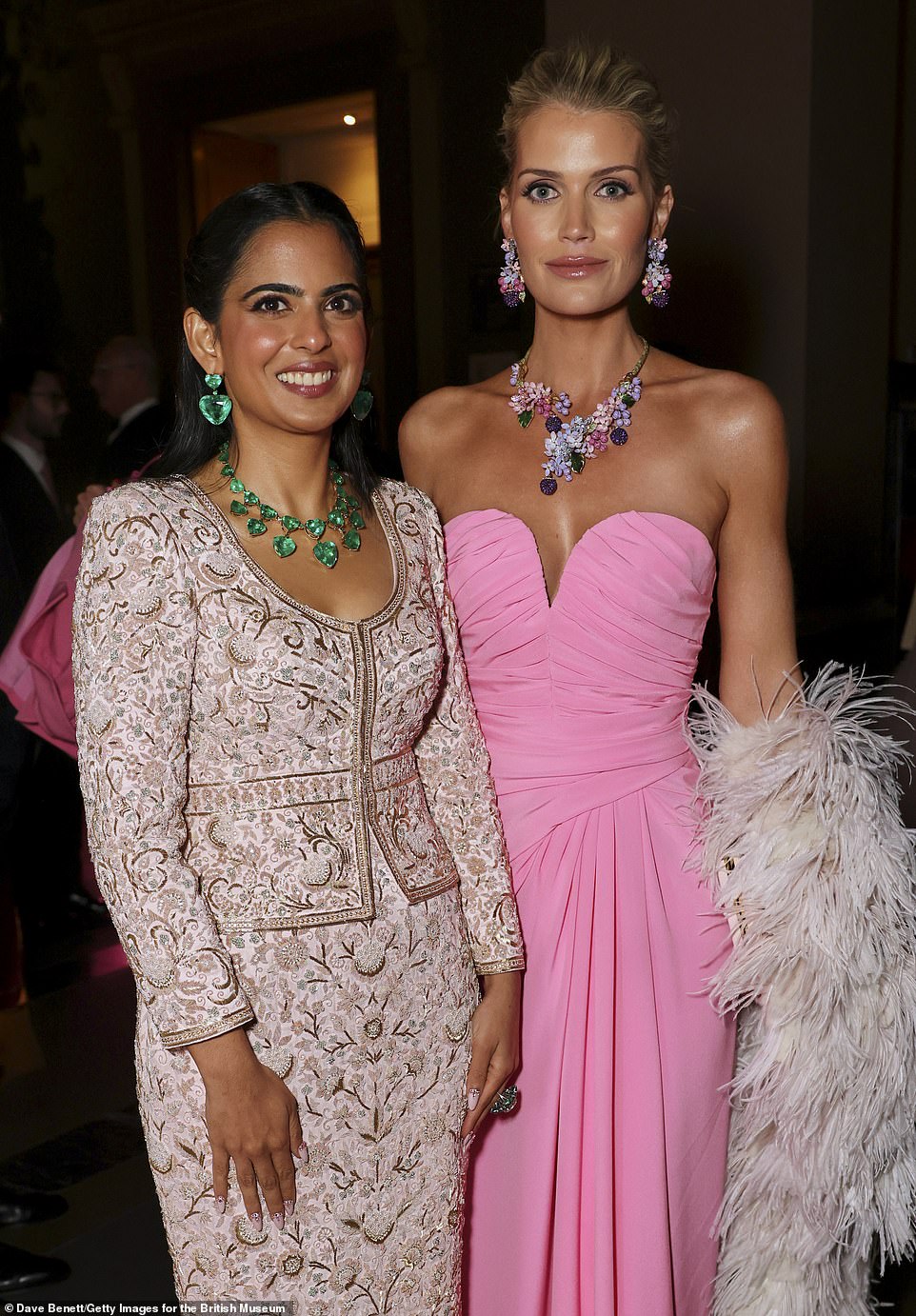 Isha stunned in a bespoke Abu Jani Sandeep Khosla dress, hand-embroidered with pearls, sequins and crystals, painstakingly created by 35 artisans over 3,670 hours (pictured alongside Lady Kitty Spencer)