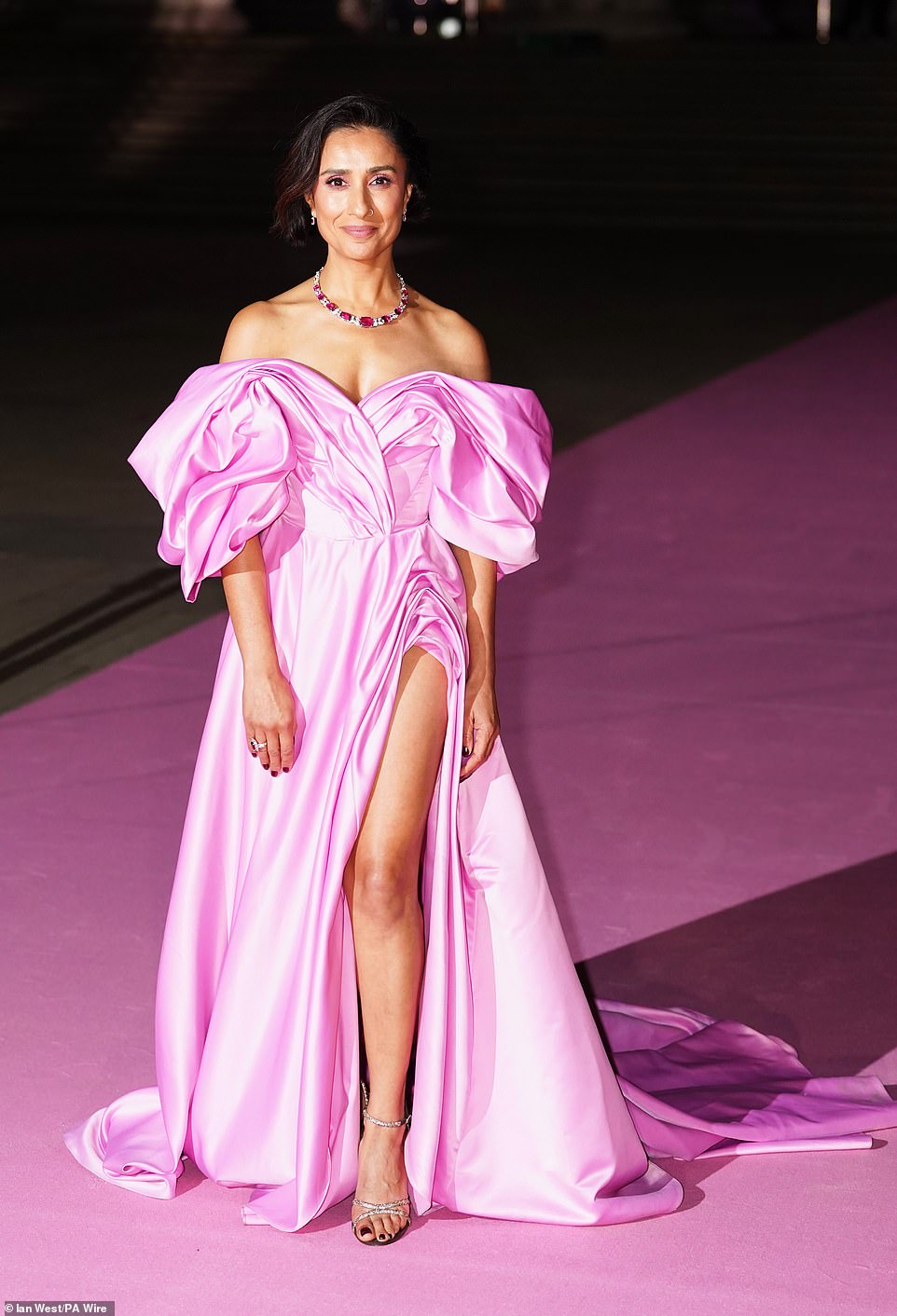 Radio presenter Anita Rani also wore pink, stepping out in a baby pink satin gown featuring huge balloon sleeves and a high leg split