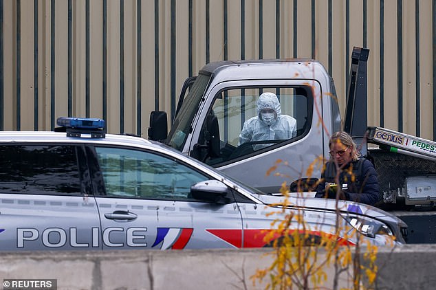 Forensics teams pictured outside the Louvre in the hours after the heist