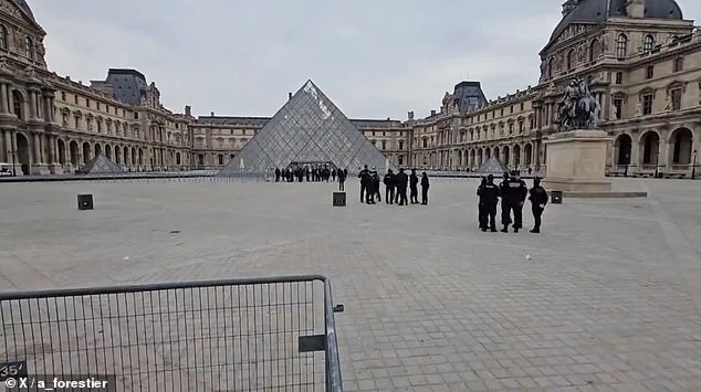 Police surround the tourist attraction on Sunday after it was reported jewellery previously belonging to Napoleon and Josephine Bonaparte was swiped from the museum