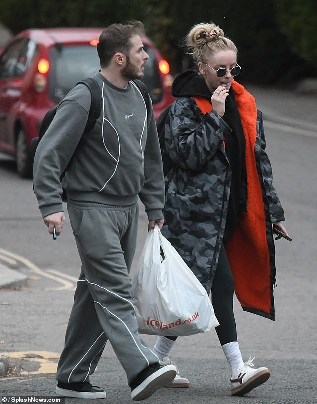 Katie was seen puffing on a vape as they walked to the theatre ahead of their evening performance
