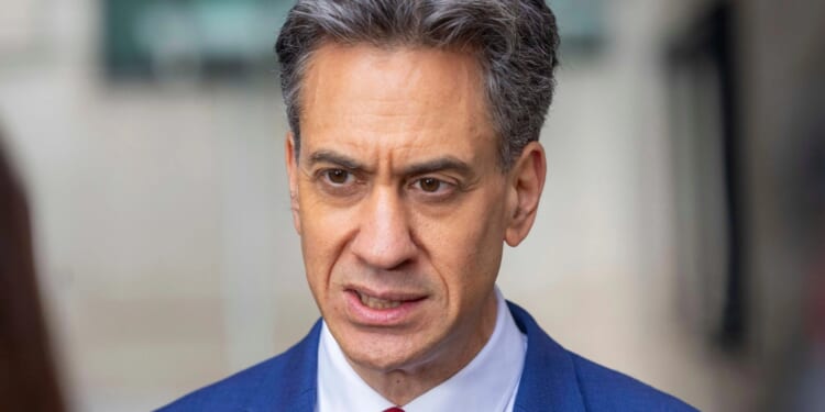 Fury as Ed Miliband is 'binding Britain to Beijing' with his 'green dogma' dash to Net Zero