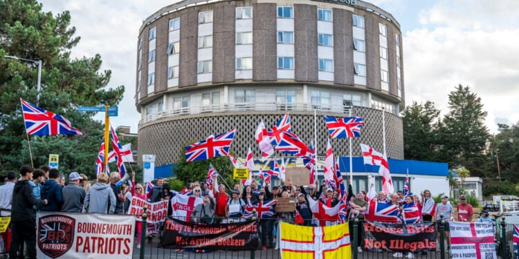 Two asylum seekers staying in a migrant hotel jailed for separate attacks on a cop and doctor