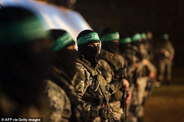Palestinian members of the Ezzedine al-Qassam Brigades, the armed wing of the Hamas movement