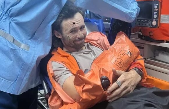 Ultra-marathon runner has his arm 'snapped off’ by bear in bloody attack with limb 'only held together by his raincoat’