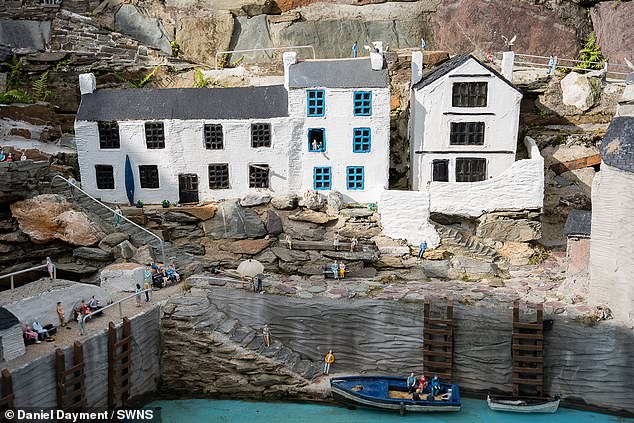 The model village in minute detail is nestled behind a family's three-bedroom converted forge in Polperro