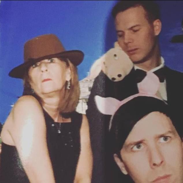 Phil (bottom right), his mother Kathryn (left) and brother Martyn (back right)