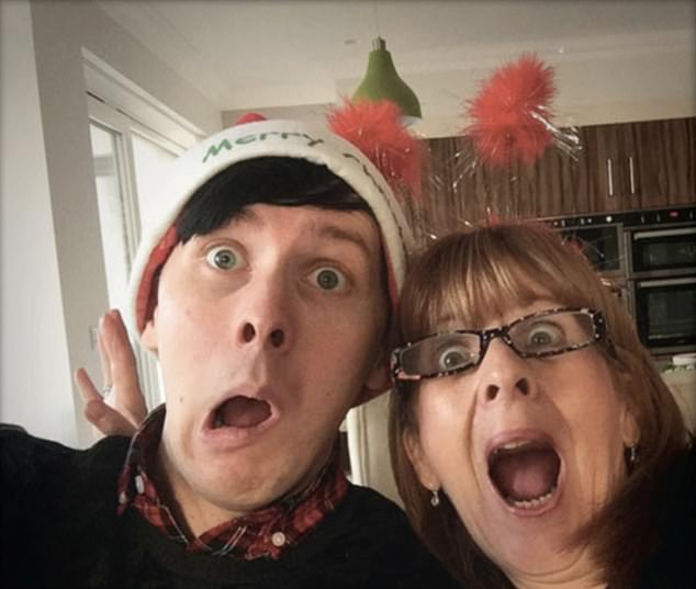 Phil and his mother Kathryn celebrate Christmas. Phil grew up in Rawtenstall, Lancashire
