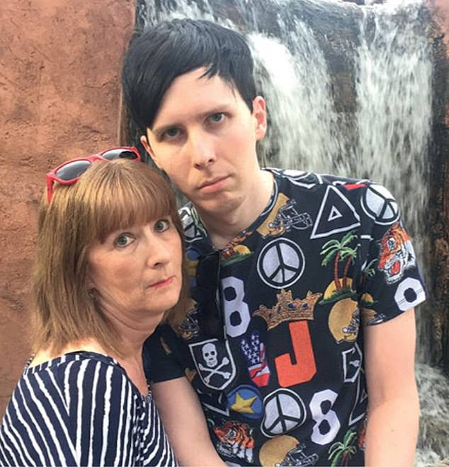 Phil and his mother Kathryn, 69, on holiday together
