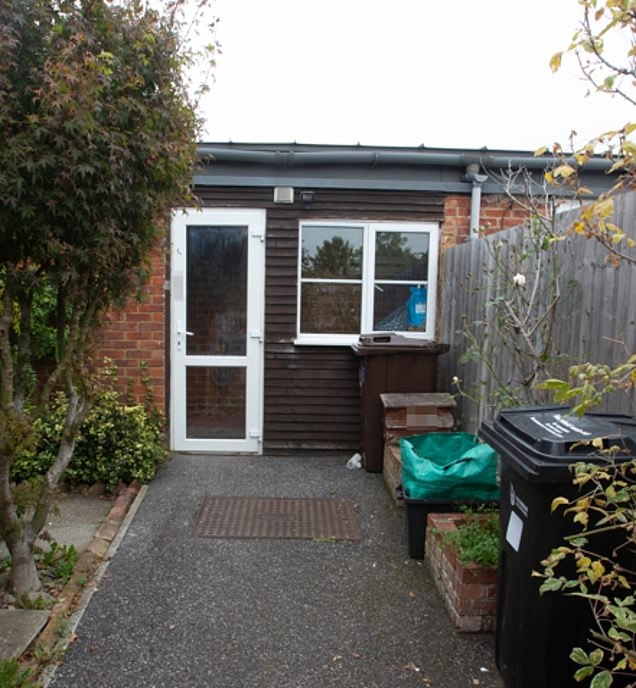 Pictured: the modest council owned terraced house in Winnersh, Berkshire, that Dan's father, Tim, 64, lives in. Dan said in his announcement of his relationship with Phil this week that it had taken so long to discuss the relationship publicly because of the effects of his 'extremely homophobic childhood'