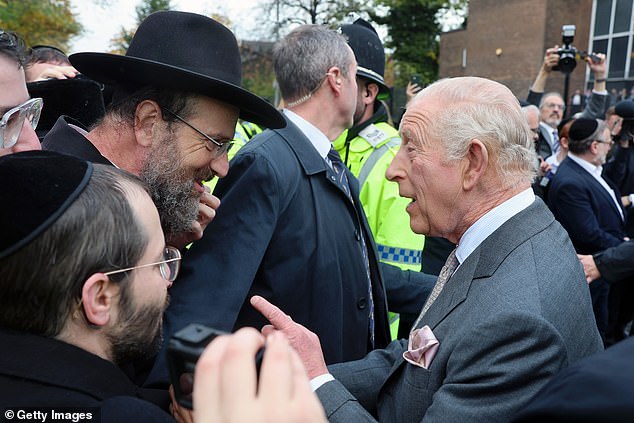 King Charles III meets people outside Heaton Park Hebrew Congregation Synagogue today