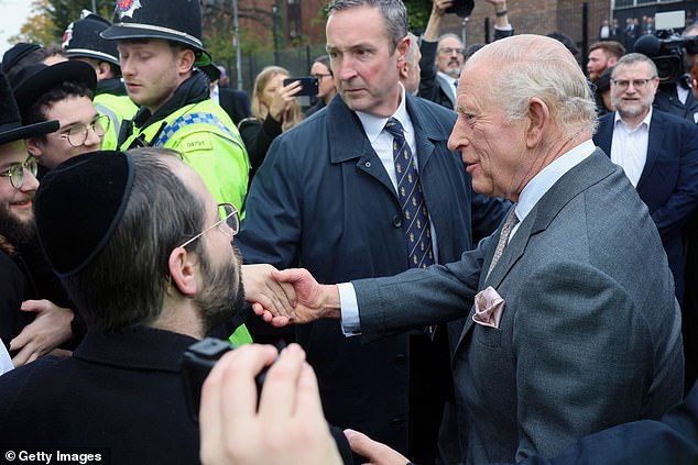 King Charles III meets people outside Heaton Park Hebrew Congregation Synagogue today