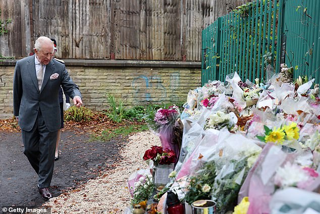 King Charles III views tributes on a visit to Heaton Park Hebrew Congregation Synagogue today