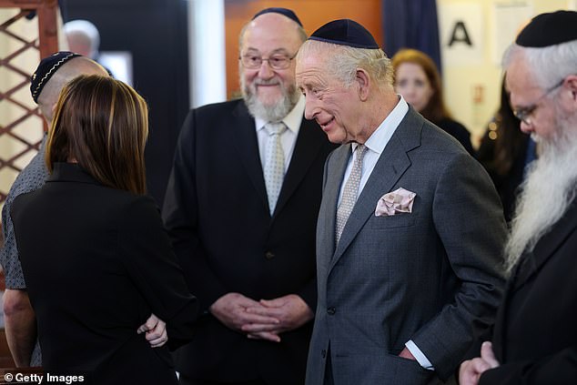 The King meets people on a trip to Heaton Park Hebrew Congregation Synagogue today