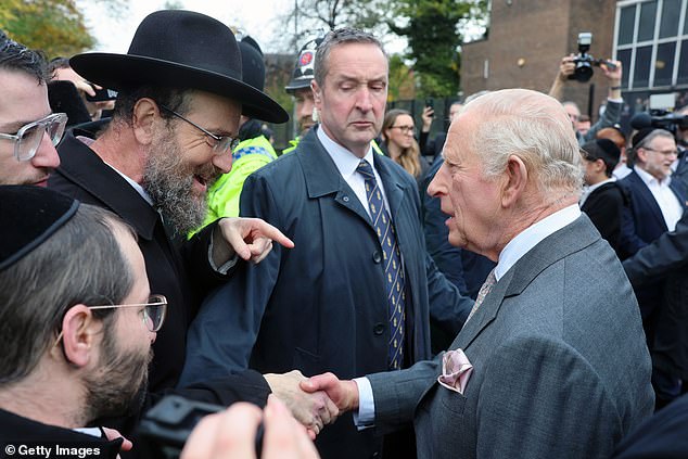King Charles III meets people outside Heaton Park Hebrew Congregation Synagogue today