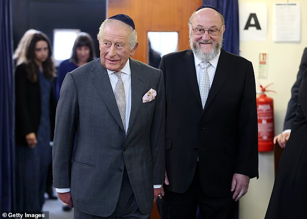 King Charles III and Chief Rabbi Sir Ephraim Mirvis at the synagogue in Manchester today