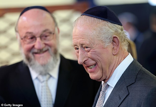 King Charles III during a visit to Heaton Park Hebrew Congregation Synagogue this afternoon