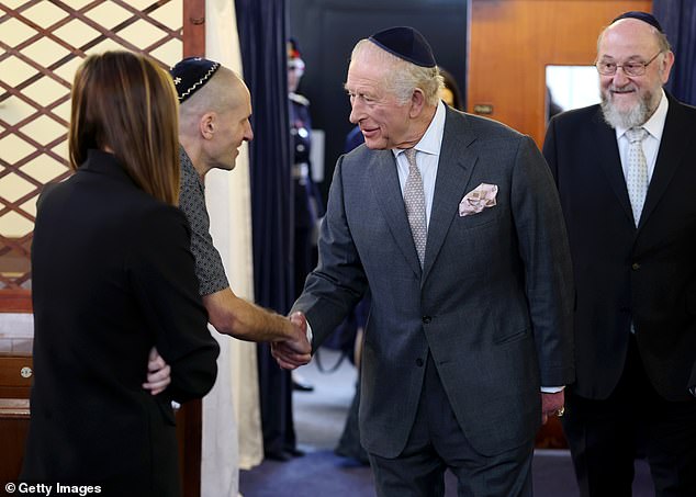 The King meets people on a trip to Heaton Park Hebrew Congregation Synagogue today