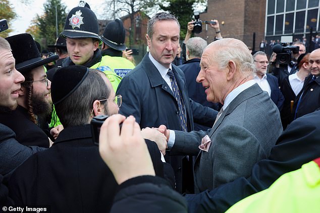 King Charles III meets people outside Heaton Park Hebrew Congregation Synagogue today