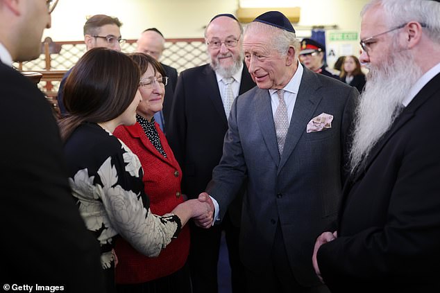 The King meets people on a trip to Heaton Park Hebrew Congregation Synagogue today