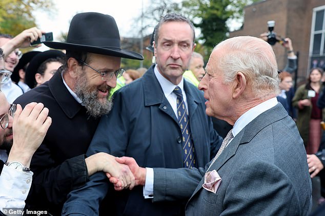 King Charles III meets people outside Heaton Park Hebrew Congregation Synagogue today