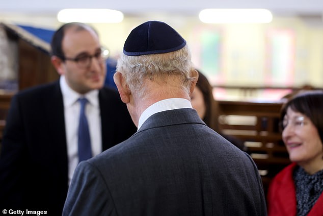 King Charles III during a visit to Heaton Park Hebrew Congregation Synagogue this afternoon