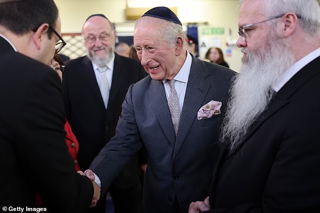 The King meets people on a trip to Heaton Park Hebrew Congregation Synagogue today