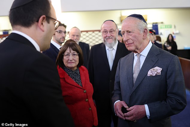 The King meets people on a trip to Heaton Park Hebrew Congregation Synagogue today