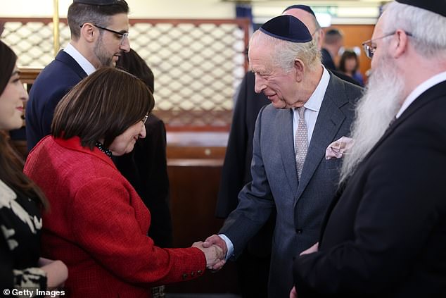 The King meets people on a trip to Heaton Park Hebrew Congregation Synagogue today