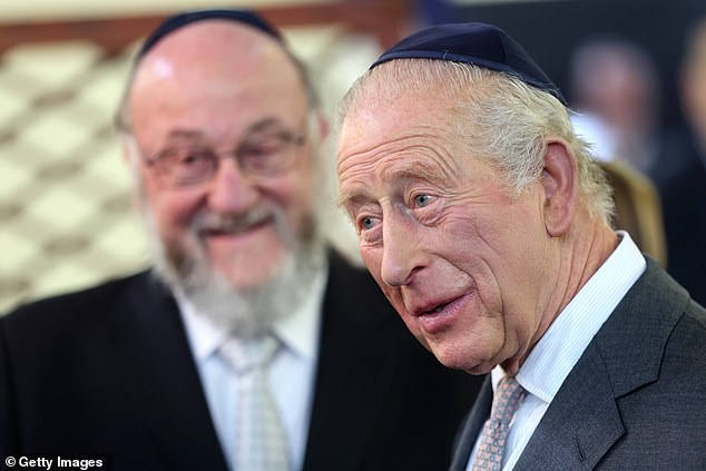 The King meets people on a trip to Heaton Park Hebrew Congregation Synagogue today