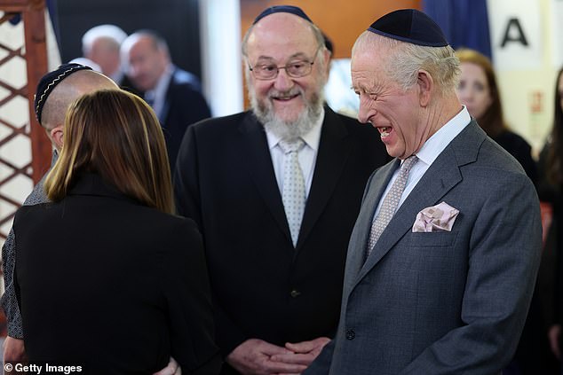 The King meets people on a trip to Heaton Park Hebrew Congregation Synagogue today